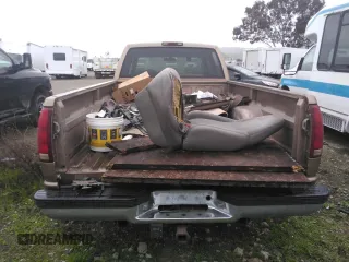 1996 GMC Sierra 1500 with VIN 1GTHC33J4TF010466, listed as a Copart auction lot 48392195 with 143,267 mi miles and Salvage Title. Bid and sale history available at DreamBid. Image 6.
