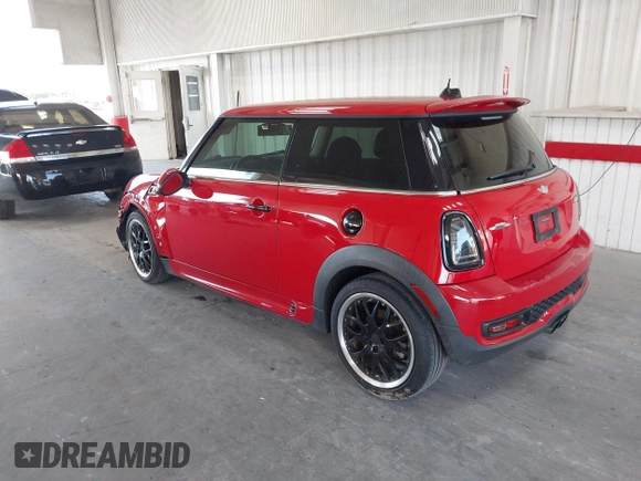2012 MINI Hardtop S with VIN WMWSV3C55CT387678, listed as a IAAI auction lot 42487337 with 111,965 mi miles and . Bid and sale history available at DreamBid. Image 3.