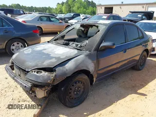 2003 Honda Civic EX with VIN 1HGES26753L005215, listed as a IAAI auction lot 42076026 with Not Provided miles and . Bid and sale history available at carsss.com. Image 2.