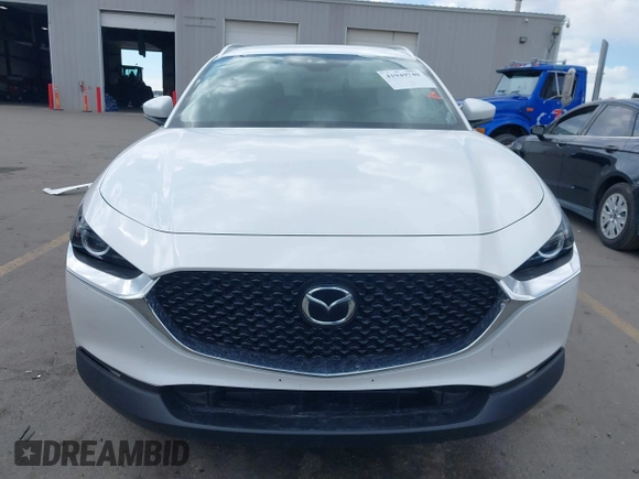 2023 Mazda CX-30 S Carbon Edition with VIN 3MVDMBCM8PM560726, listed as a IAAI auction lot 41949740 with 35,164 mi miles and . Bid and sale history available at carsss.com. Image 12.
