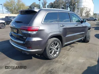 2019 Jeep Grand Cherokee Summit with VIN 1C4RJFJG0KC553199, listed as a IAAI auction lot 41352836 with 67,556 mi miles. Bid and sale history available at carsss.com. Image 4.