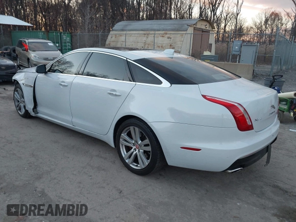 2017 Jaguar XJ with VIN SAJWJ2GD5H8W08395, listed as a IAAI auction lot 41014883 with 80,584 mi miles. Bid and sale history available at carsss.com. Image 3.