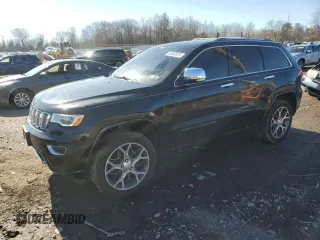 2019 Jeep Grand Cherokee Overland with VIN 1C4RJFCG9KC569575, listed as a Copart auction lot 48952875 with 87,053 mi miles and Salvage Title. Bid and sale history available at carsss.com. Image 1.