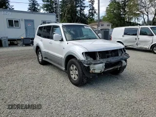 2003 Mitsubishi Montero Limited z VIN JA4NW51S23J042311, wystawiony jako Copart lot #54429895 z przebiegiem 119 138 mil mil oraz Szkoda całkowita • Salvage title. Historia ofert i sprzedaży dostępna na DreamBid. Obrazek 14.