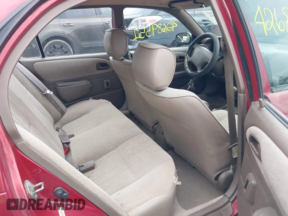1997 Toyota Corolla with VIN 1NXBA02E7VZ538706, listed as a IAAI auction lot 42689551 with 301,005 mi miles and . Bid and sale history available at DreamBid. Image 8.
