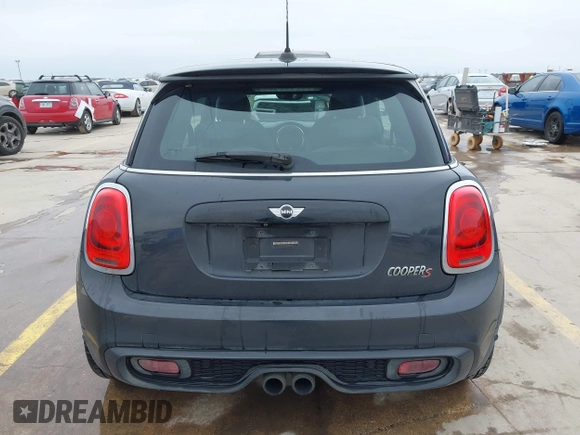 2014 MINI Hardtop S with VIN WMWXM7C56ET926604, listed as a IAAI auction lot 41642560 with 81,219 mi miles and . Bid and sale history available at DreamBid. Image 16.