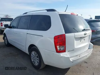 2011 Kia Sedona LX with VIN KNDMG4C74B6376150, listed as a IAAI auction lot 41820075 with 182,568 mi miles. Bid and sale history available at carsss.com. Image 3.