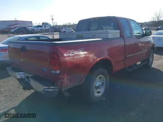 2000 Ford F-150 XL with VIN 1FTRX18W2YNB60283, listed as a IAAI auction lot 41510168 with 237,825 mi miles. Bid and sale history available at carsss.com. Image 4.