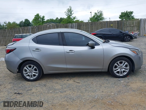 2016 Scion iA z VIN 3MYDLBZV5GY144289, wystawiony jako IAAI lot #42247688 z przebiegiem 107 958 mil mil oraz . Historia ofert i sprzedaży dostępna na DreamBid. Obrazek 13.