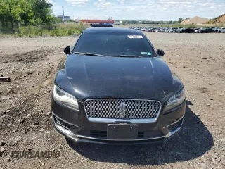 2017 Lincoln MKZ Select z VIN 3LN6L5D97HR601971, wystawiony jako Copart lot #57715655 z przebiegiem 130 071 mil mil oraz Czysty tytuł • Clean title. Historia ofert i sprzedaży dostępna na DreamBid. Obrazek 5.