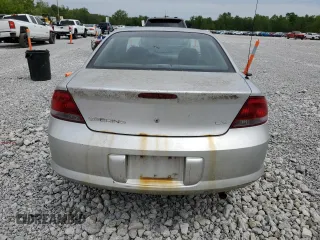 2001 Chrysler Sebring LX z VIN 1C3EL46X21N656640, wystawiony jako Copart lot #58402415 z przebiegiem 85 594 mil mil oraz Tytuł czysty. Historia ofert i sprzedaży dostępna na DreamBid. Obrazek 6.
