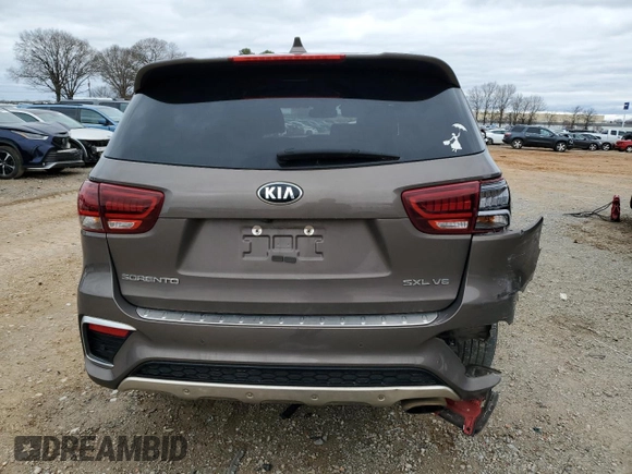 2019 Kia Sorento SX z VIN 5XYPK4A51KG591866, wystawiony jako Copart lot #47398695 z przebiegiem 119 126 mil mil oraz Szkoda całkowita • Salvage title. Historia ofert i sprzedaży dostępna na DreamBid. Obrazek 6.