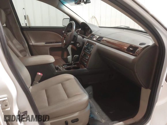 2008 Ford Taurus Limited with VIN 1FAHP25W28G173633, listed as a IAAI auction lot 40994885 with 133,974 mi miles. Bid and sale history available at carsss.com. Image 5.