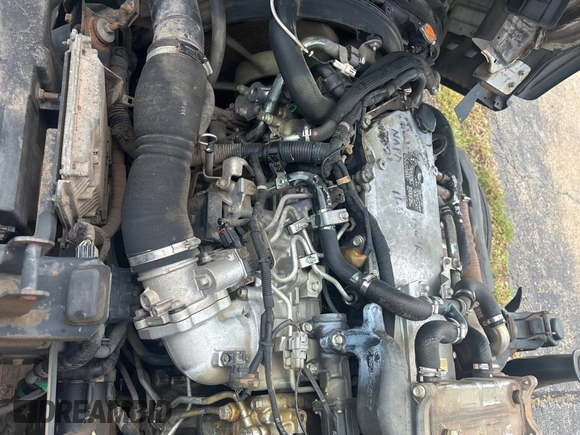 2011 Isuzu NRR IBT with VIN JALE5W169B7900028, listed as a Copart auction lot 60338775 with 415,661 mi miles and Clean title. Bid and sale history available at DreamBid. Image 7.