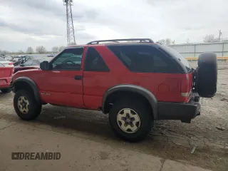 2001 Chevrolet Blazer LS z VIN 1GNCT18W71K247094, wystawiony jako Copart lot #53748065 z przebiegiem 145 695 mil mil oraz Szkoda całkowita • Salvage title. Historia ofert i sprzedaży dostępna na DreamBid. Obrazek 2.