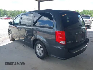 2012 Dodge Grand Caravan SXT z VIN 2C4RDGCG6CR122031, wystawiony jako IAAI lot #42215011 z przebiegiem 254 331 mil mil oraz . Historia ofert i sprzedaży dostępna na DreamBid. Obrazek 3.