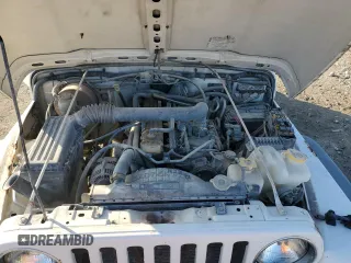 2004 Jeep Wrangler Sport Right Hand Drive with VIN 1J4F449S54P775671, listed as a Copart auction lot 85610114 with 199,074 mi miles and Salvage Title. Bid and sale history available at carsss.com. Image 11.