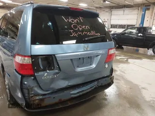 2006 Honda Odyssey EX with VIN 5FNRL38466B123206, listed as a IAAI auction lot 41731572 with 110,792 mi miles. Bid and sale history available at carsss.com. Image 6.