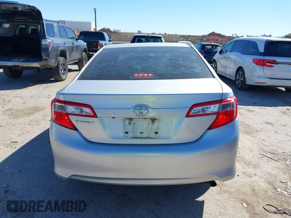 2014 Toyota Camry L with VIN 4T1BF1FK7EU856848, listed as a IAAI auction lot 41729604 with 100,148 mi miles. Bid and sale history available at carsss.com. Image 16.