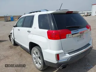 2016 GMC Terrain SLT z VIN 2GKFLPE37G6159617, wystawiony jako IAAI lot #42277132 z przebiegiem 128 987 mil mil oraz . Historia ofert i sprzedaży dostępna na DreamBid. Obrazek 3.