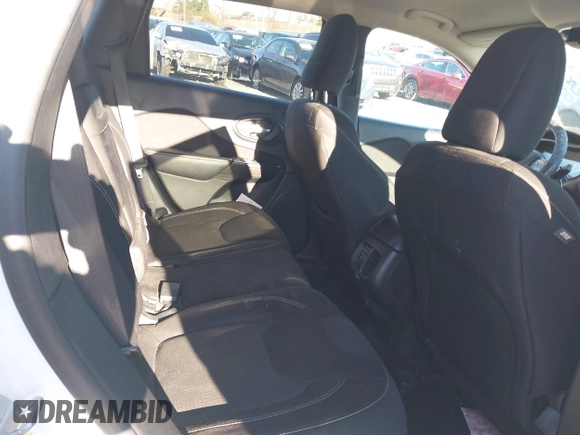 2015 Jeep Cherokee Latitude with VIN 1C4PJMCB3FW734573, listed as a IAAI auction lot 41825561 with 141,250 mi miles. Bid and sale history available at carsss.com. Image 8.