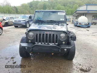 2016 Jeep Wrangler Unlimited 75th Anniversary with VIN 1C4HJWEG3GL198641, listed as a Copart auction lot 55892035 with 128,702 mi miles and Salvage title. Bid and sale history available at DreamBid. Image 5.