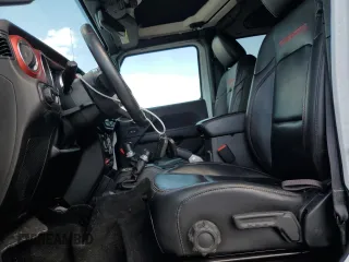2018 Jeep Wrangler Unlimited Rubicon z VIN 1C4HJXFN3JW176213, wystawiony jako Copart lot #53963755 z przebiegiem 53 094 mil mil oraz Szkoda całkowita • Salvage title. Historia ofert i sprzedaży dostępna na DreamBid. Obrazek 7.