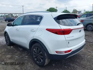 2018 Kia Sportage EX with VIN KNDPNCACXJ7409142, listed as a IAAI auction lot 42665448 with 80,537 mi miles and . Bid and sale history available at DreamBid. Image 3.