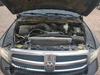 2014 Ram 1500 Big Horn z VIN 1C6RR7LT4ES475102, wystawiony jako Copart lot #58693015 z przebiegiem 128 829 mil mil oraz Szkoda całkowita • Salvage title. Historia ofert i sprzedaży dostępna na DreamBid. Obrazek 11.