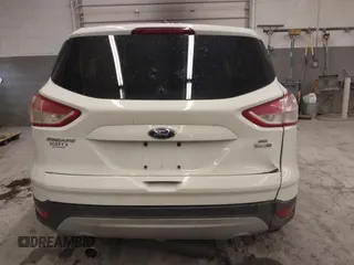 2013 Ford Escape SE with VIN 1FMCU9GX8DUC68815, listed as a IAAI auction lot 42028850 with 83,297 mi miles and . Bid and sale history available at DreamBid. Image 16.
