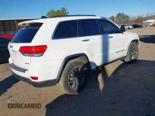 2017 Jeep Grand Cherokee Limited with VIN 1C4RJEBG8HC887899, listed as a IAAI auction lot 41242803 with 96,574 mi miles and . Bid and sale history available at DreamBid. Image 4.