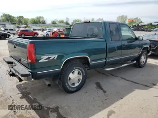 1998 Chevrolet Silverado 1500 with VIN 2GCEK19R4W1143733, listed as a Copart auction lot 54298895 with 210,091 mi miles and Salvage Title. Bid and sale history available at DreamBid. Image 3.