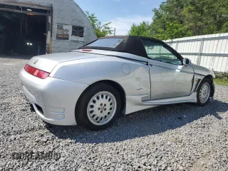 1996 Alfa Romeo Spider z VIN ZAR91600006013048, wystawiony jako Copart lot #62495174 z przebiegiem 143 888 mil mil oraz Szkody całkowita. Historia ofert i sprzedaży dostępna na DreamBid. Obrazek 3.