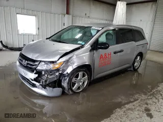 2015 Honda Odyssey LX with VIN 5FNRL5H27FB106960, listed as a Copart auction lot 51207935 with 144,668 mi miles and Salvage Title. Bid and sale history available at carsss.com. Image 1.