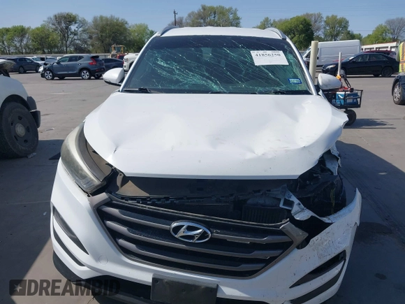 2016 Hyundai Tucson Limited with VIN KM8J33A24GU160815, listed as a IAAI auction lot 41856250 with 98,609 mi miles. Bid and sale history available at carsss.com. Image 12.