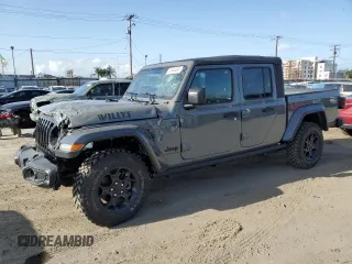 2023 Jeep Gladiator Willys z VIN 1C6HJTAG0PL561098, wystawiony jako Copart lot #51646485 z przebiegiem 20 554 mil mil oraz Szkoda całkowita • Salvage title. Historia ofert i sprzedaży dostępna na DreamBid. Obrazek 1.