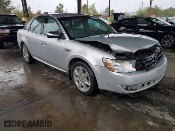 2009 Ford Taurus Limited with VIN 1FAHP25W09G100990, listed as a Copart auction lot 80745234 with 129,692 mi miles and Salvage Title. Bid and sale history available at carsss.com. Image 4.