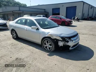 2012 Ford Fusion SE with VIN 3FAHP0HGXCR331498, listed as a Copart auction lot 61859325 with 61,445 mi miles and Salvage title. Bid and sale history available at DreamBid. Image 14.