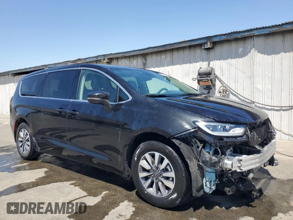 2023 Chrysler Pacifica Hybrid Touring L with VIN 2C4RC1L78PR632368, listed as a Copart auction lot 61763955 with 41,494 mi miles and Clean title. Bid and sale history available at DreamBid. Image 4.