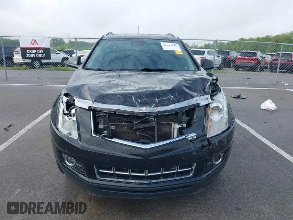 2015 Cadillac SRX Performance Collection with VIN 3GYFNCE3XFS638994, listed as a IAAI auction lot 42243558 with 141,704 mi miles and . Bid and sale history available at DreamBid. Image 12.