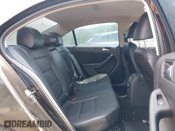 2014 Volkswagen Jetta SE with VIN 3VWD17AJ2EM392821, listed as a IAAI auction lot 42621085 with 102,211 mi miles and . Bid and sale history available at DreamBid. Image 8.