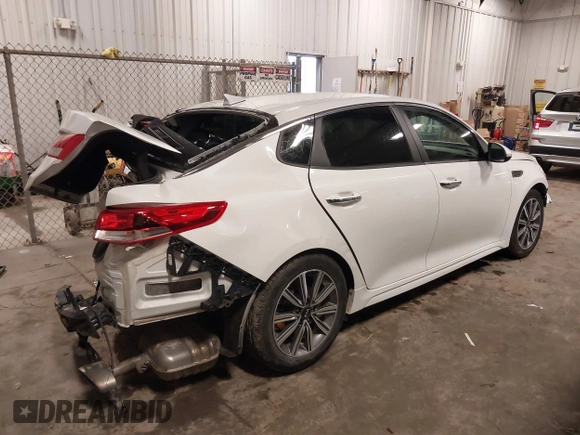 2019 Kia Optima LX with VIN 5XXGT4L38KG369502, listed as a IAAI auction lot 39820086 with 117,802 mi miles. Bid and sale history available at carsss.com. Image 4.