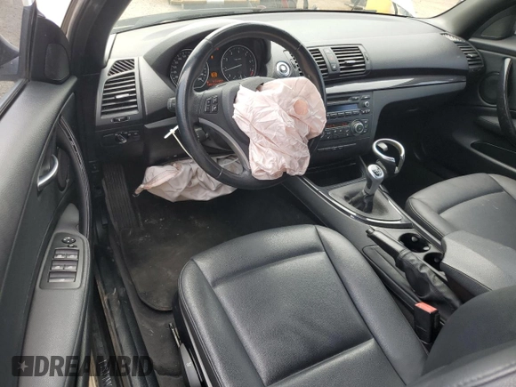 2012 BMW 1 Series 128i with VIN WBAUL7C52CVE87413, listed as a Copart auction lot 60557095 with 148,311 mi miles and Clean title. Bid and sale history available at DreamBid. Image 8.
