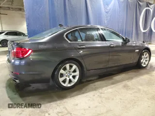 2013 BMW 5 Series 550i xDrive with VIN WBAFU9C57DDY71564, listed as a Copart auction lot 48030035 with 115,040 mi miles and Clean Title. Bid and sale history available at carsss.com. Image 3.