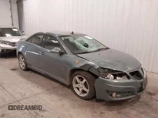2009 Pontiac G6 1SB z VIN 1G2ZJ57K794252976, wystawiony jako IAAI lot #41309642 z przebiegiem 165 488 mil mil oraz . Historia ofert i sprzedaży dostępna na DreamBid. Obrazek 1.