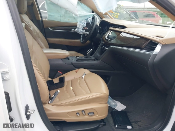 2021 Cadillac XT6 Premium Luxury with VIN 1GYKPFRS0MZ100879, listed as a IAAI auction lot 41083030 with 56,502 mi miles. Bid and sale history available at carsss.com. Image 5.