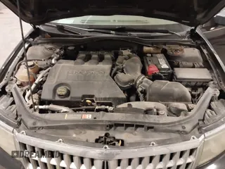 2008 Lincoln MKZ with VIN 3LNHM28T78R639677, listed as a IAAI auction lot 41376122 with 160,591 mi miles. Bid and sale history available at carsss.com. Image 10.