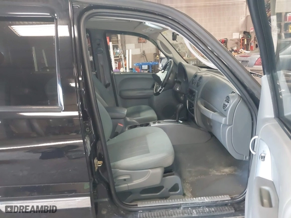 2005 Jeep Liberty Limited with VIN 1J8GL58K05W709307, listed as a IAAI auction lot 41642426 with 81,908 mi miles. Bid and sale history available at carsss.com. Image 5.