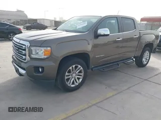 2016 GMC Canyon 2WD SLT with VIN 1GTG5DE38G1271225, listed as a IAAI auction lot 41801681 with 209,454 mi miles. Bid and sale history available at carsss.com. Image 2.