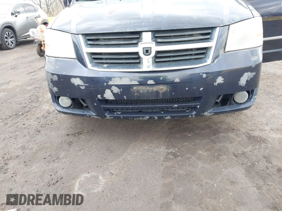 2010 Dodge Grand Caravan SXT with VIN 2D4RN5D13AR426980, listed as a IAAI auction lot 42035672 with 162,584 mi miles and . Bid and sale history available at DreamBid. Image 6.